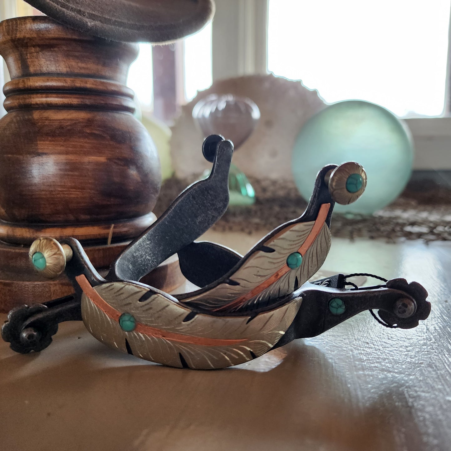 Copper and turquoise feather spurs